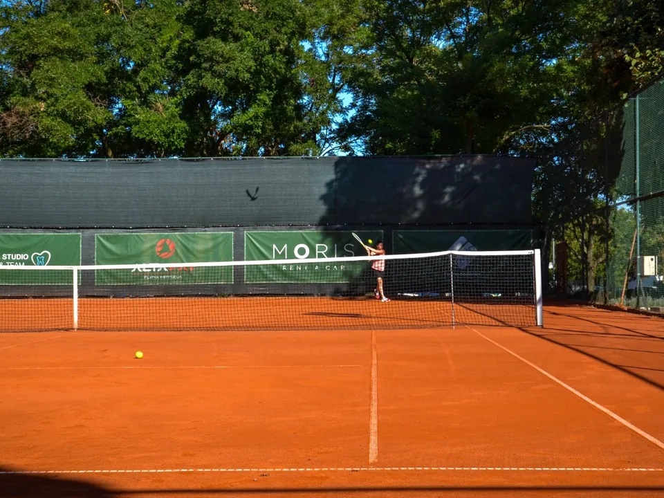 Clay court surface in a premium club context
